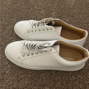 White men's sneakers.